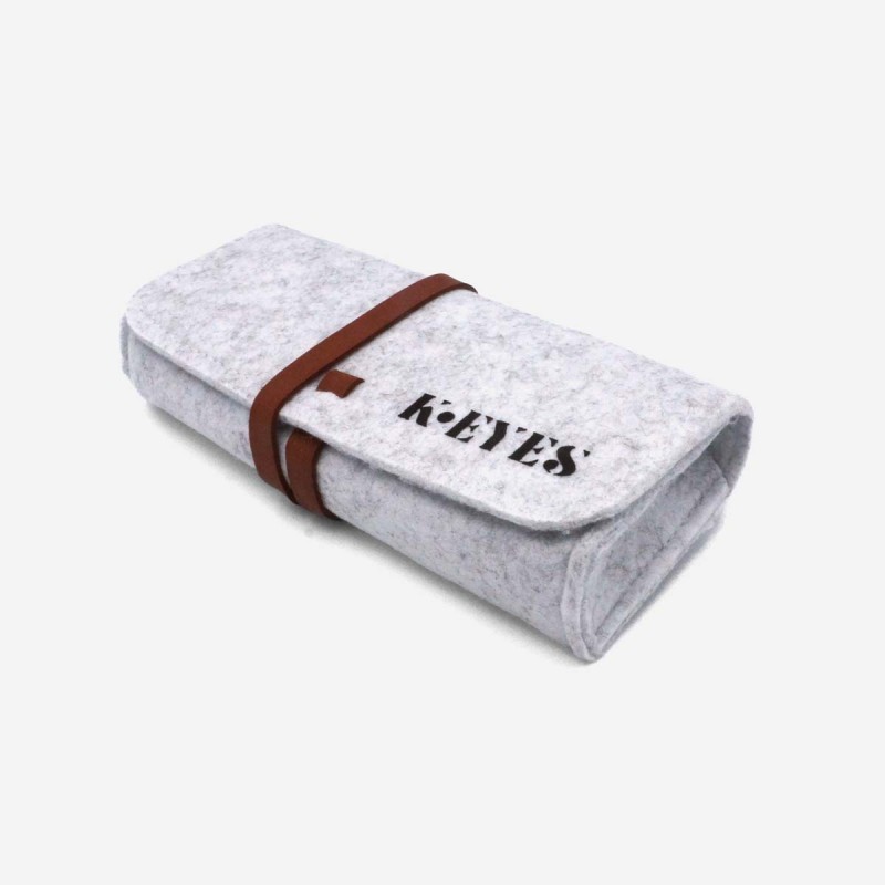 Eyewear case in grey felt with a mottled grey finish